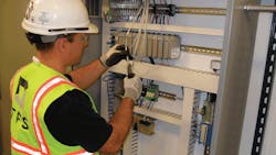 TFS Electric is terminating a Programmable Logic Controller PLC which is the controller for the Building Management System BMS TFS Electric is terminating a Programmable Logic Controller PLC which is the controller for the Building Management System BMS