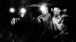 Wearing head-lamps to light their way through this coal mine, this historic image, provided by the Center for Disease Control and Prevention&apos;s (CDC) National Institute for Occupational Safety and Health (NIOSH), depicted three miners as they were strategizing their next move. Note that none of the men was wearing and protective filtered breathing devices, which is now protocol under such circumstances. Unfortunately, some mine operators still operate as if it&rsquo;s 1960.