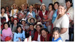 INDIGENOUS actively workers with over a dozen fair trade filed organizing teams and quality control centers that coordinate over 300 knitting and hand-looming artisan work groups like this one.