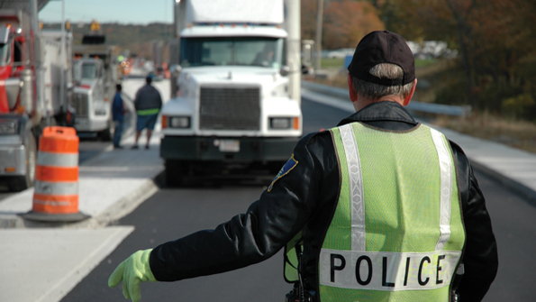 The report found that MassDOT employees and state police officers are at high risk of being struck by motor vehicles while working on roadways