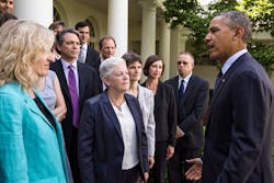 President Barack Obama with Environmental Protection Agency Administrator Gina McCarthy center talks with EPA staff members who worked on the powerplant emissions standards in the Rose Garden of the White House June 2 President Barack Obama with Environmental Protection Agency Administrator Gina McCarthy center talks with EPA staff members who worked on the powerplant emissions standards in the Rose Garden of the White House June 2
