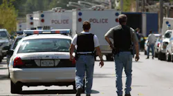 Chicago Police are seen near Windy City Core Supply Inc an autoparts warehouse where 36yearold Salvador Tapia killed six people on Aug 27 2003 a few months after he39d been fired Photo by Tim BoyleGetty Images