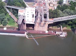 Booms have been deployed on the Ohio River to contain a 12mile long oil slick Booms have been deployed on the Ohio River to contain a 12mile long oil slick