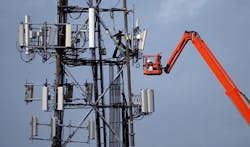 A worker climbs on a cellular communication tower on March 6 2014 in Oakland Calif The US Labor Department is partnering with the Federal Communications Commission and leaders in the telecommunications industry to improve safety for workers Photo by Justin SullivanGetty Images A worker climbs on a cellular communication tower on March 6 2014 in Oakland Calif The US Labor Department is partnering with the Federal Communications Commission and leaders in the telecommunications industry to improve safety for workers Photo by Justin SullivanGetty Images