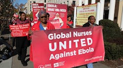 Registered nurses march on Nov. 12 in Washington, D.C., as part of Global Ebola Awareness Day.