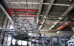 A plane undergoes maintenance at Thai Airways39 Don Mueang Maintenance Center A plane undergoes maintenance at Thai Airways39 Don Mueang Maintenance Center