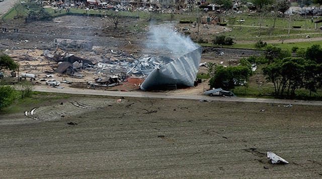 Debris litters a farmer&apos;s field after An explosion leveled the West Fertilizer Co., shown from the air on April 18, 2013 in West, Texas.