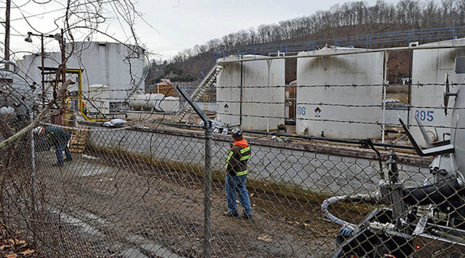 In this photo from Jan. 10, 2014, leaking MCHN tanks at Freedom Industries are being off loaded into tanker trucks in Charleston, W.Va. West Virginia American Water determined that MCHM from the leaking tanks had overwhelmed the plant&apos;s capacity and contaminated the public water system for 300,000 people. TSCA now will require EPA to quickly review and regulate &ldquo;high priority&rdquo; chemicals, including chemicals stored near drinking water sources, and sets deadlines for companies to comply with new EPA rules.
