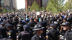 Police officers and sheriffs from around the country helped control large crowds of supporters and protestors on the streets of Cleveland during the Republican National Convention.