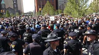 Police officers and sheriffs from around the country helped control large crowds of supporters and protestors on the streets of Cleveland during the Republican National Convention.