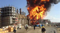 Workers and contractors run away from an explosion at the Williams Olefins Plant in Geismar La which killed two employees