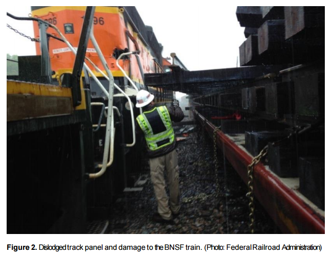 Figure 2 in the NTSB investigation report shoes a dislodged track panel and damage to the BNSF train The Federal Railroad Administration is credited with the photo