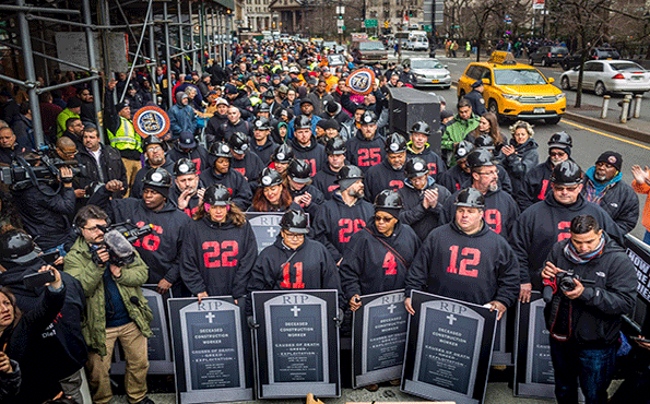 Photographer Michael Nigro captured this photo of hundreds of construction workers and union members who demonstrated in lower Manhattan on Jan 18 2017 in a planned act of civil disobedience They are carrying coffins and grave markers representing the construction workers who have died in New York in recent months Thirtyone people were quotarrestedquot to symbolize the 31 construction site deaths that have occurred in New York City in the past 24 months