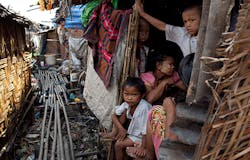 Burmese children live in squalor in small huts without proper sanitation in the slum area of Hlaing Thaya Yangon Myanmar Burma The Burmese government spends only 03 percent of its gross domestic product on health the lowest amount worldwide Burmese children live in squalor in small huts without proper sanitation in the slum area of Hlaing Thaya Yangon Myanmar Burma The Burmese government spends only 03 percent of its gross domestic product on health the lowest amount worldwide