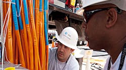 OSHA has accused AT&amp;T of suspending 13 workers without pay for reporting injuries.