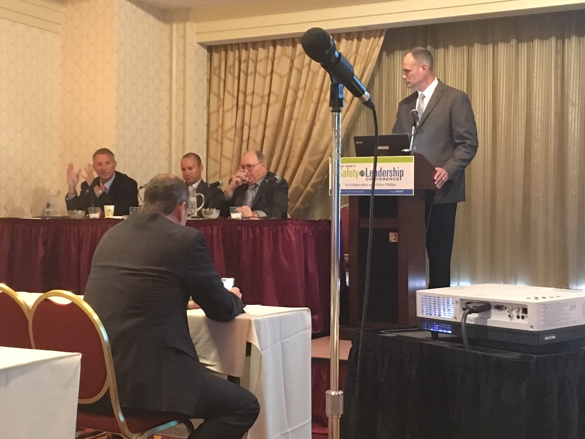 Left to right: Mike Bellaman, Ryan Odendahl and Jimmy Slaughter speak to SLC attendees