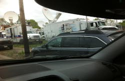 Nearly two dozen satellite trucks were parked in a vacant lot on Seymour Avenue as crews scrambled to broadcast news about three women who were freed and reunited with their families more than a decade after being abducted from Cleveland streets Nearly two dozen satellite trucks were parked in a vacant lot on Seymour Avenue as crews scrambled to broadcast news about three women who were freed and reunited with their families more than a decade after being abducted from Cleveland streets