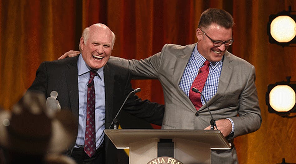 Honoree Terry Bradshaw (L) and NFL analyst Howie Long onstage at the Friars Club Roast of Bradshaw during the ESPN Super Bowl Roast at the Arizona Biltmore on Jan. 29, 2015 in Phoenix. (Photo by Michael Buckner/Getty Images for Friars Club)