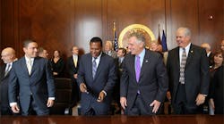VPP Act bill signing in Virginia. Pictured from left: VPPPA Government Affairs Counsel Courtney Malveaux, Sen. Kenneth Alexander (D), Gov. Terry McAuliffe (D) and Labor Commissioner C. Ray Davenport. (Photo Credit: Michaele White, Governor&apos;s Office)