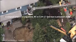 A construction worker was killed when he was sucked into a sinkhole in front of a Long Island, N.Y., home.