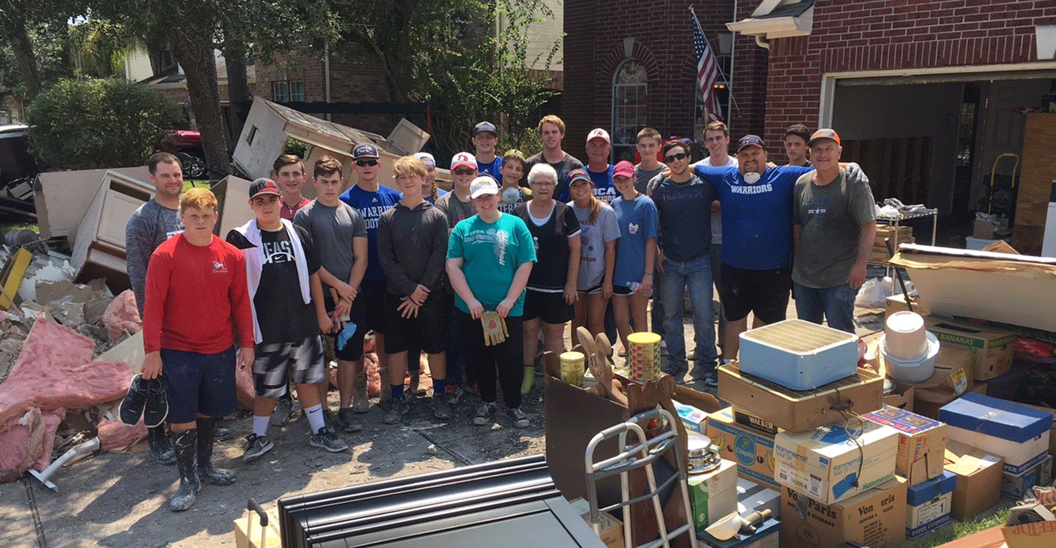 H+M employees help each other with hurricane cleanup