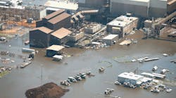 Floodwater left in the wake of Hurricane and Tropical Storm Harvey begins to recede in an industrial area on August 31 near Houston.