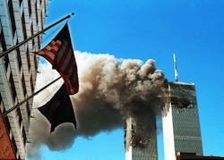Smoke pours from the World Trade Center on September 11 2001 after it was hit by two planes in a coordinated terrorist attack Photo by Craig AllenGetty Images Smoke pours from the World Trade Center on September 11 2001 after it was hit by two planes in a coordinated terrorist attack Photo by Craig AllenGetty Images