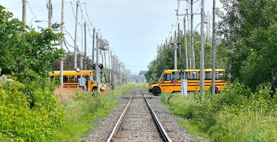 bus crossing railroad