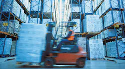 Man Operating Forklift in Warehouse
