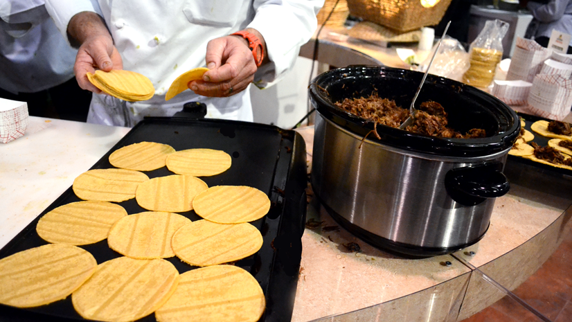 The Avocados From Mexico booth prepared tacos with an avocado topping