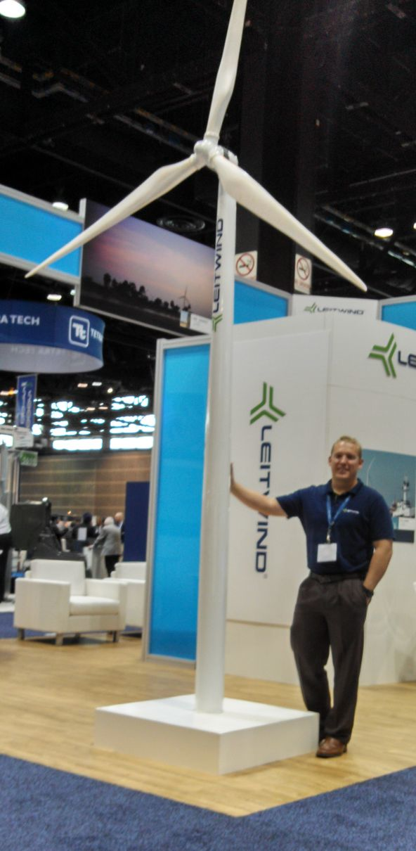 Leitwind is part of a company that got its start as a maker of ski lifts and other kinds of ropeways Figuring out what else it could do in hilly regions led to the idea of fielding wind turbinesThe company39s wind turbines use a direct drive no gearbox A multipole synchronous PM generator hooks directly to the rotor in a design that rotates more than 20 times slower than ordinary turbines Leitwind had a model of its turbine at the show shown here with the company39s business development manag