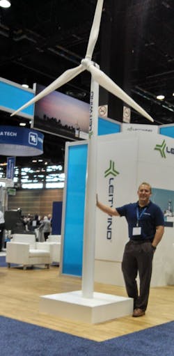 Leitwind is part of a company that got its start as a maker of ski lifts and other kinds of ropeways Figuring out what else it could do in hilly regions led to the idea of fielding wind turbinesThe company39s wind turbines use a direct drive no gearbox A multipole synchronous PM generator hooks directly to the rotor in a design that rotates more than 20 times slower than ordinary turbines Leitwind had a model of its turbine at the show shown here with the company39s business development manag Leitwind is part of a company that got its start as a maker of ski lifts and other kinds of ropeways Figuring out what else it could do in hilly regions led to the idea of fielding wind turbinesThe company39s wind turbines use a direct drive no gearbox A multipole synchronous PM generator hooks directly to the rotor in a design that rotates more than 20 times slower than ordinary turbines Leitwind had a model of its turbine at the show shown here with the company39s business development manag