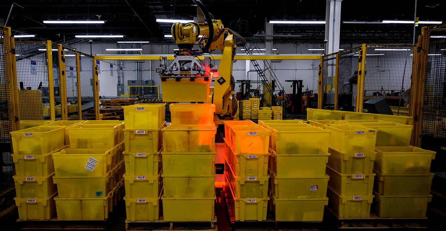 amazon-robot-warehouse-arm-yellow-tubs-JOHANNES-EISELE-AFP-Getty-Images.jpg