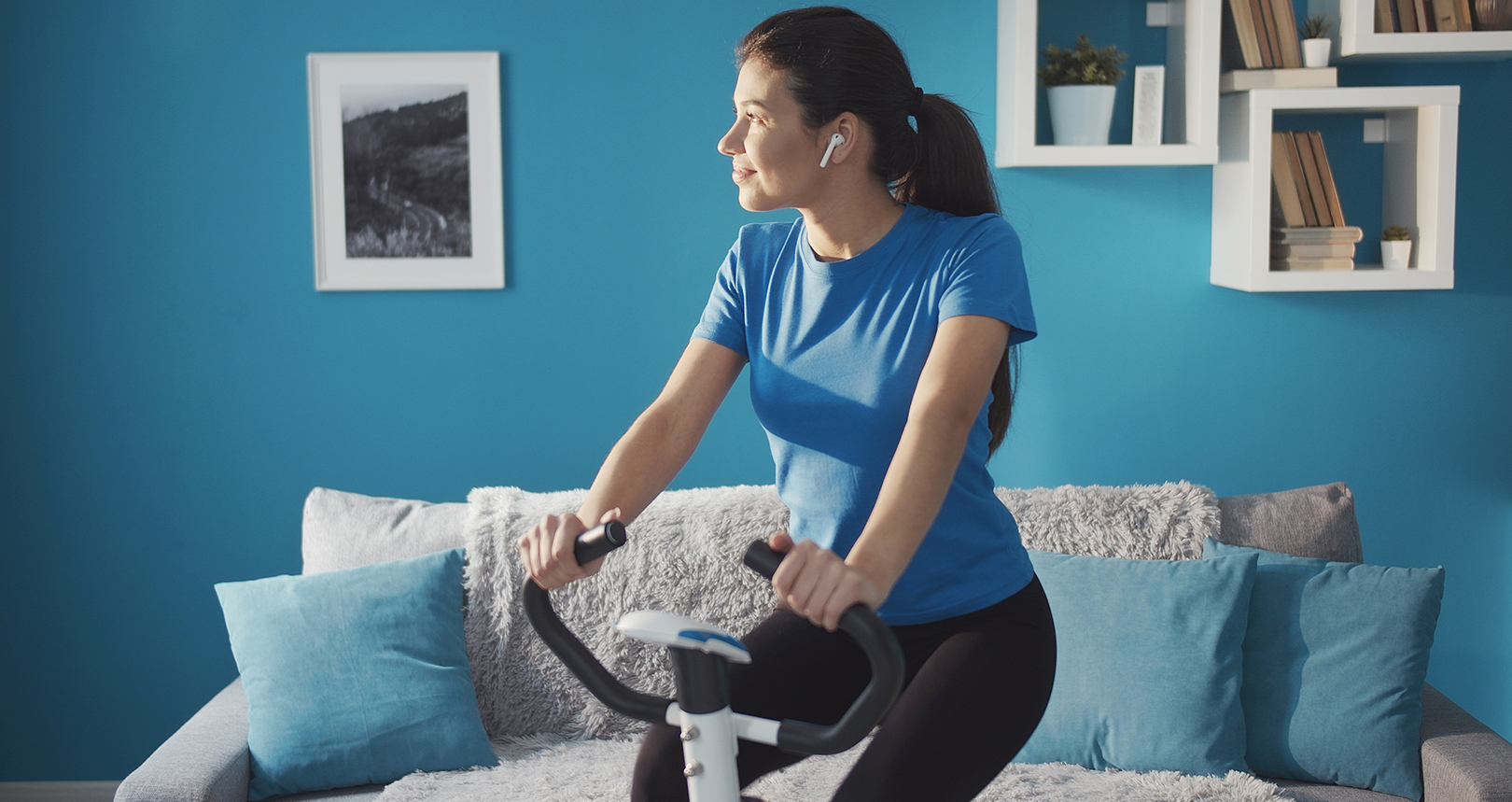 Woman On Exercise Bike 5e9e5d09822f1