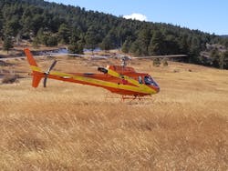 Flight for Life Colorado on an incident standby. Large fields like this work well for landing zones but can be complicated with more trees or site work.