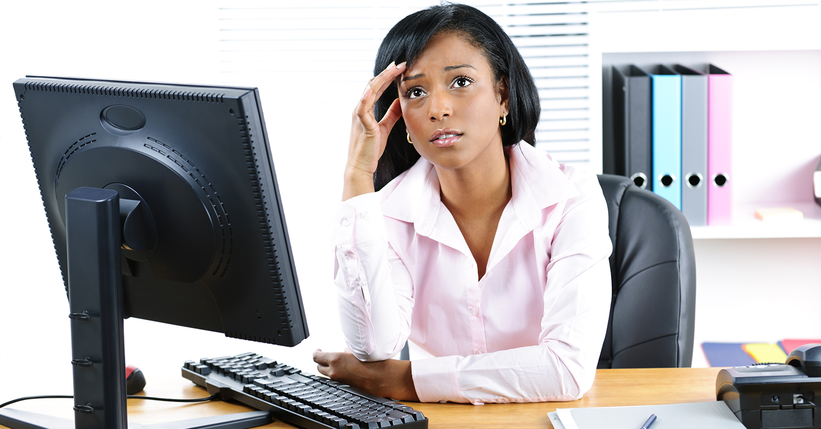 Woman Stressed At Desk
