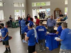 Nautique employees visit with vendors and organizations at the 4th annual Earth Day Expo. Nautique employees visit with vendors and organizations at the 4th annual Earth Day Expo.