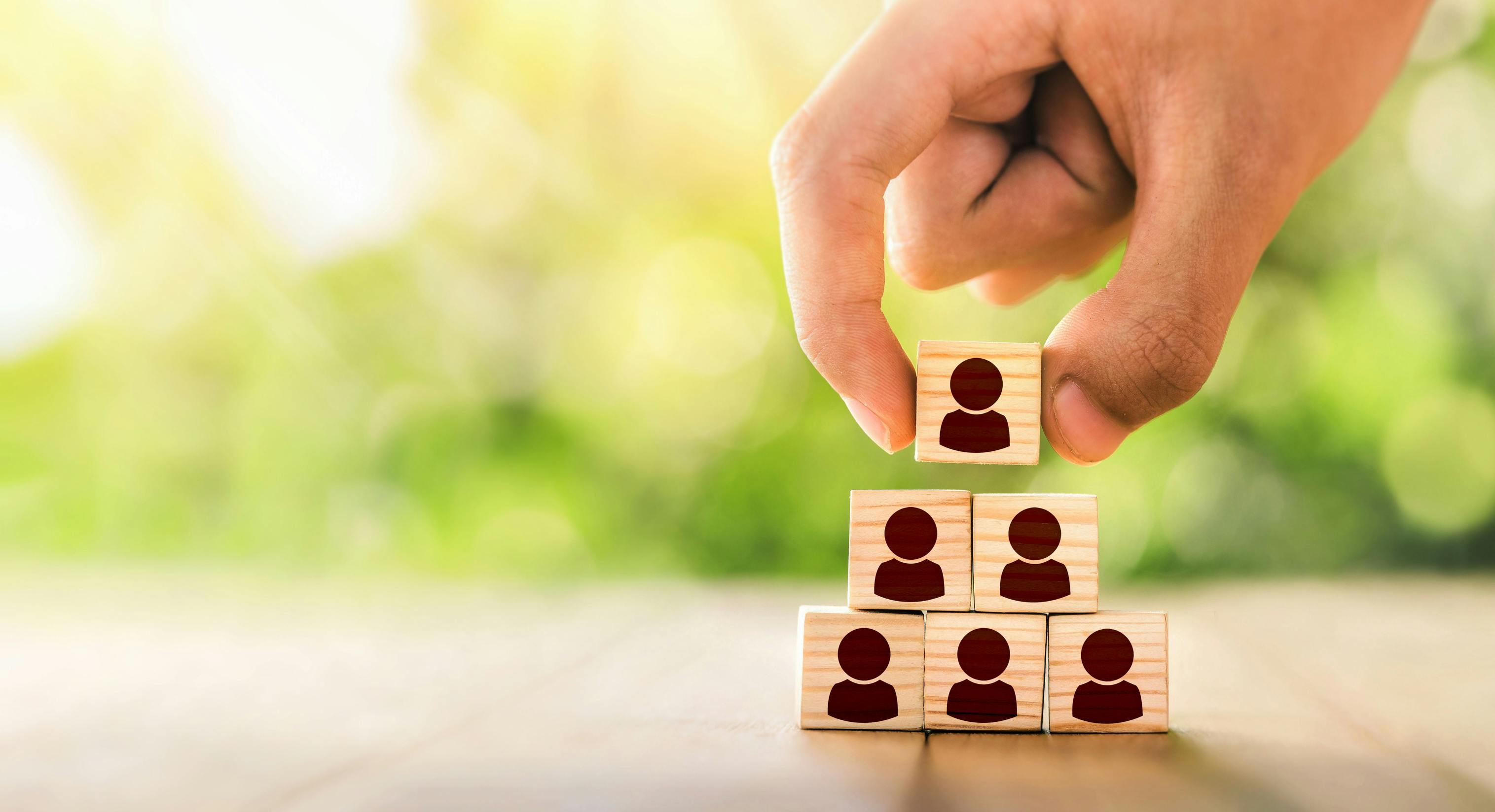 blocks stacked in a pyramid, representing leadership