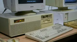 Close up photo of an old desktop computer circa the 1980s Close up photo of an old desktop computer circa the 1980s