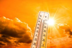 picture of a thermometer in the foreground and clouds and sun in the background picture of a thermometer in the foreground and clouds and sun in the background