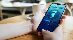 person holding smartphone with screen that shows podcast playing person holding smartphone with screen that shows podcast playing