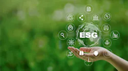 hand outstretched against green backdrop representing concept of environmental, social and governance (ESG) hand outstretched against green backdrop representing concept of environmental, social and governance (ESG)