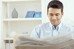 man reading newspaper man reading newspaper