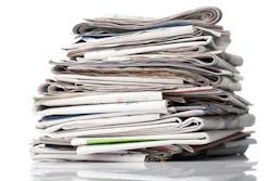 stack of newspapers stack of newspapers