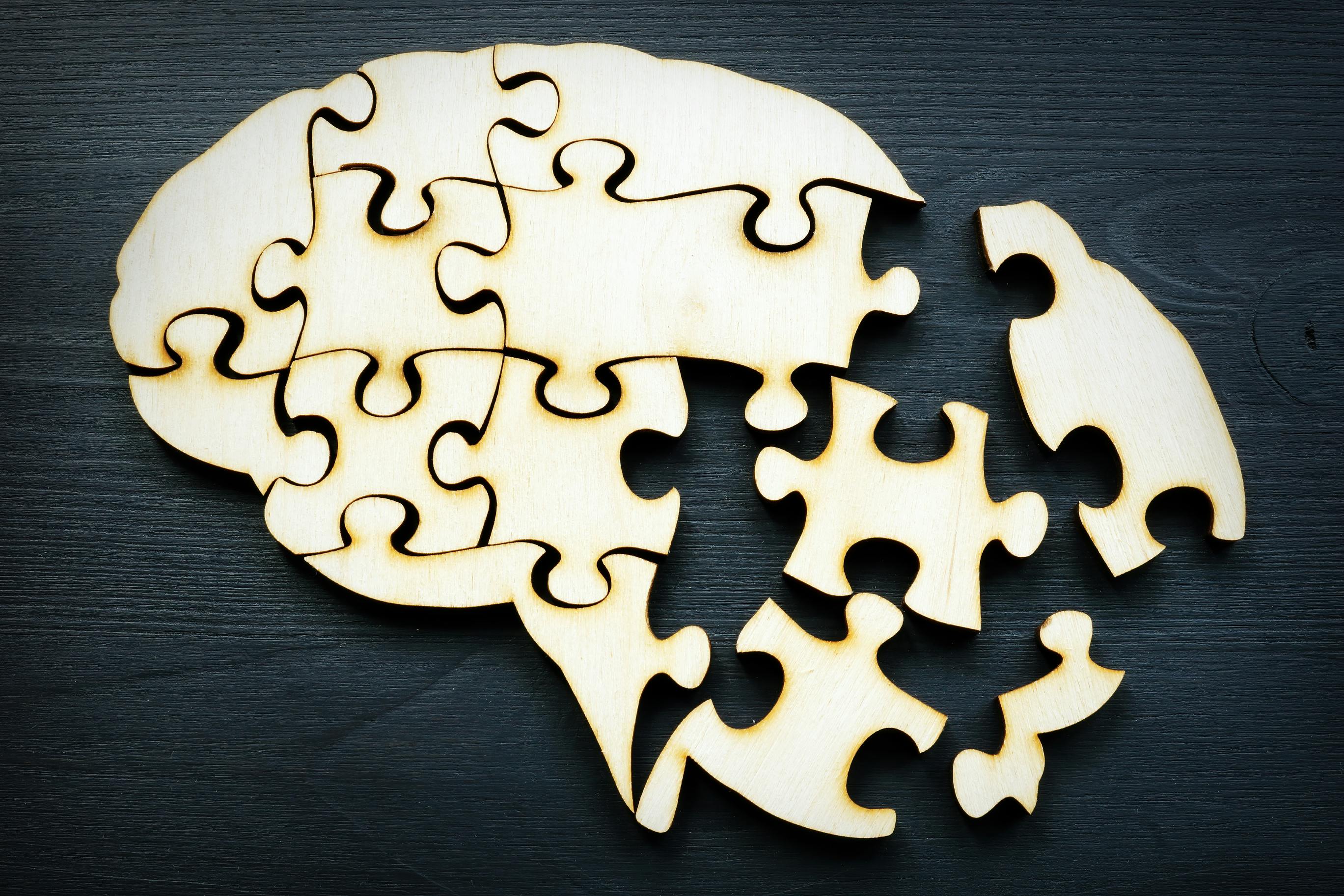 Puzzle pieces in the shape of a human brain. Concept of mental health.