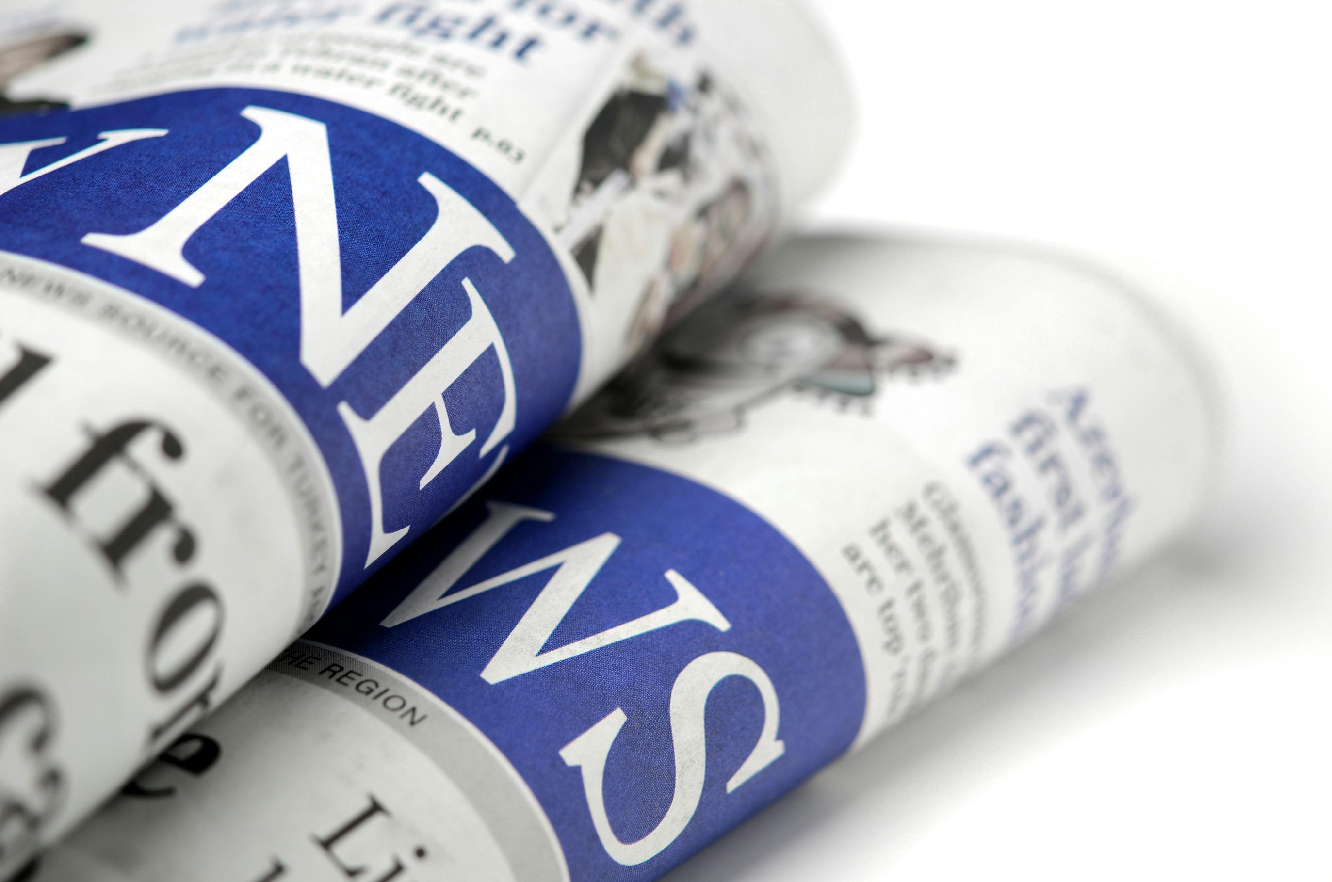 picture of rolled up newspaper