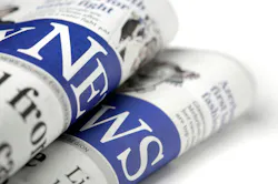 picture of rolled up newspaper